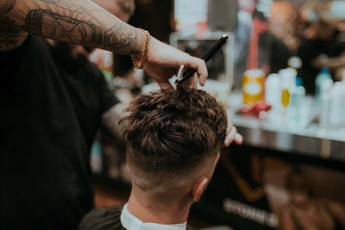 barber giving haircut