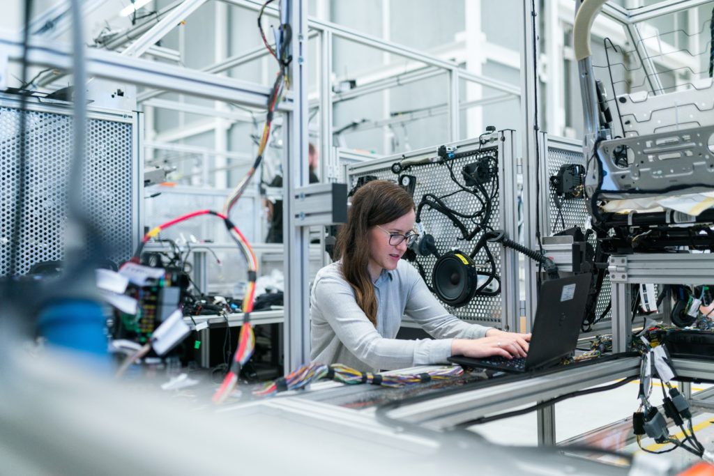 electrical engineer sitting among computers